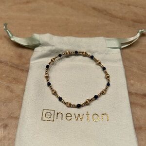 Enewton size 6.25 gold and lapis bracelet